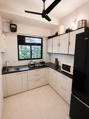 Kitchen in 1 BHK Apartment at Bombay Taximens CHS, Lbs Marg – for Rent