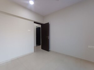 Bedroom in 2 BHK Apartment at Siddhi Highland Haven, Balkum Pada – for Rent