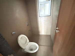 Bathroom in 2 BHK Apartment at Venkatesh Hillside, Dhayari – for Rent
