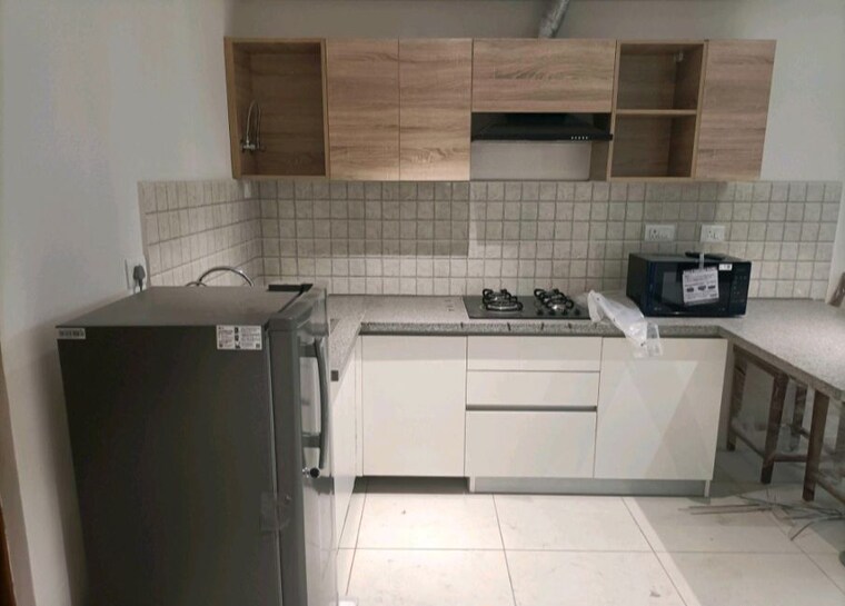 Kitchen, godrej-golf-links-evoke 2 Bedroom 975 Sq.Ft. Apartment In Sector 27 Yamuna Expressway Greater Noida 10543329
