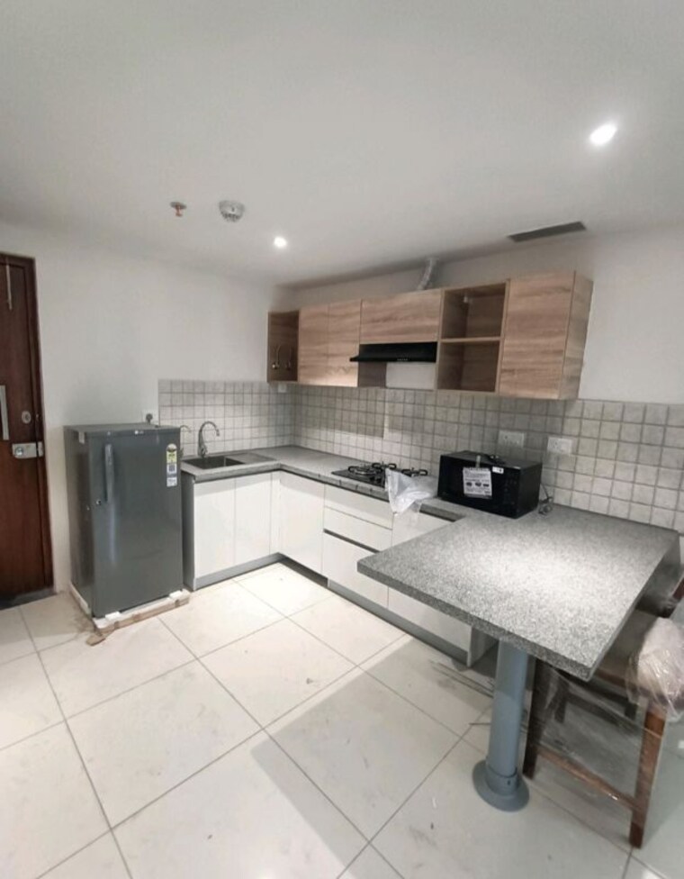 Kitchen, godrej-golf-links-evoke 2 Bedroom 975 Sq.Ft. Apartment In Sector 27 Yamuna Expressway Greater Noida 10543329