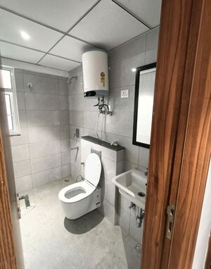 Bathroom in 2 BHK Apartment at Godrej Golf Links Evoke, Sector 27 Yamuna Expressway – for Rent