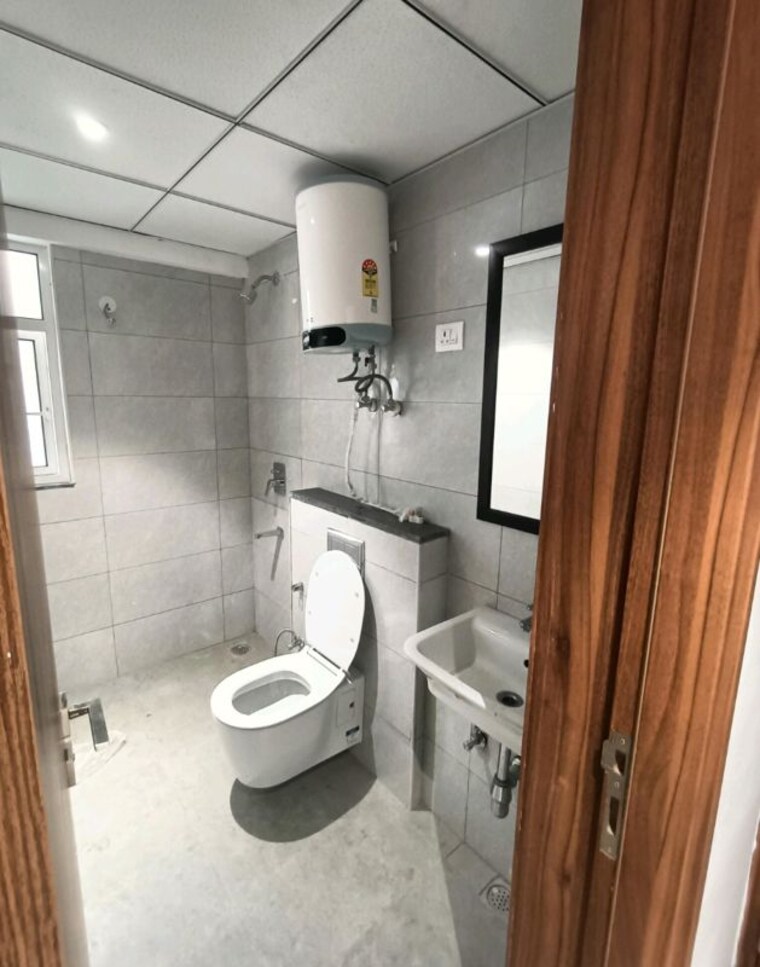 Bathroom, godrej-golf-links-evoke 2 Bedroom 975 Sq.Ft. Apartment In Sector 27 Yamuna Expressway Greater Noida 10543329