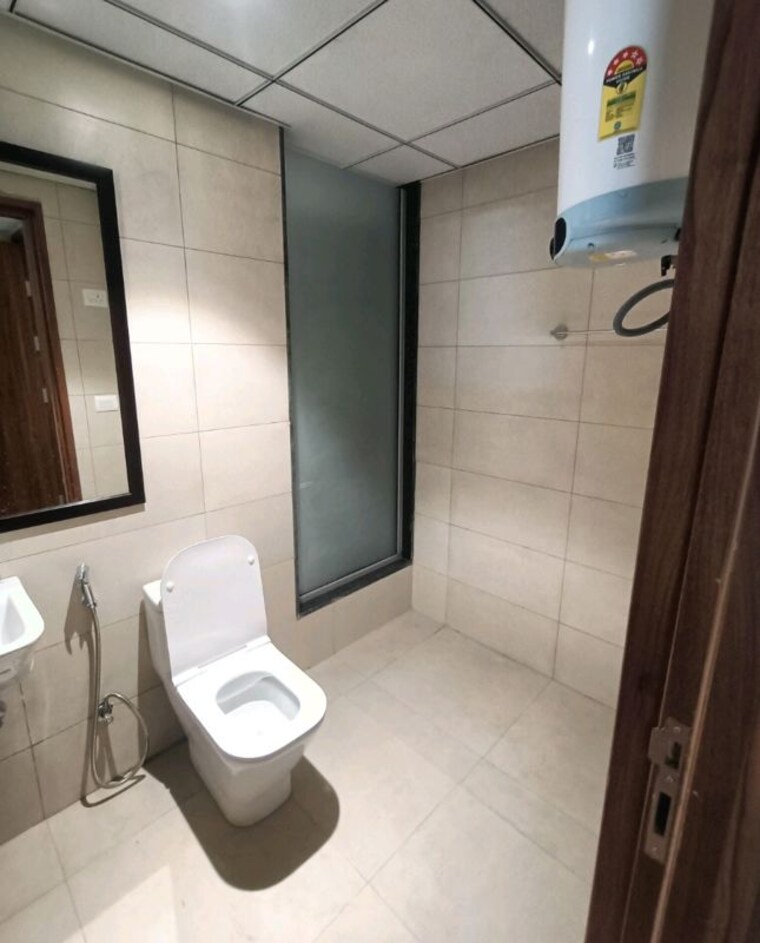 Bathroom, godrej-golf-links-evoke 2 Bedroom 975 Sq.Ft. Apartment In Sector 27 Yamuna Expressway Greater Noida 10543329