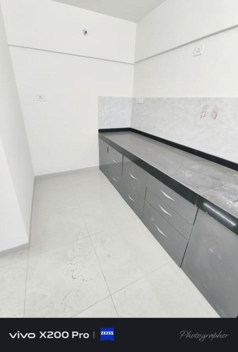 Kitchen, wadgaon sheri 2 Bedroom 750 Sq.Ft. Apartment In Wadgaon Sheri Pune 10543318