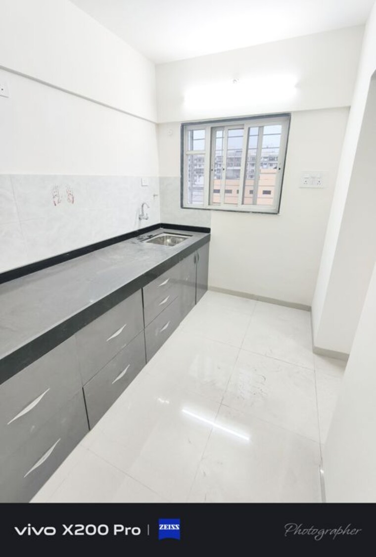 Kitchen, wadgaon sheri 2 Bedroom 750 Sq.Ft. Apartment In Wadgaon Sheri Pune 10543318