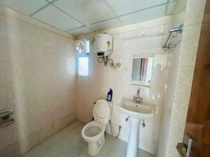 Bathroom in 3 BHK Apartment at Sam Palm Olympia, Sector 16c Greater Noida – for Rent