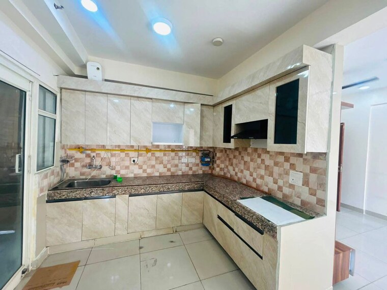 Kitchen, sam-palm-olympia 3 Bedroom 1335 Sq.Ft. Apartment In Sector 16c Greater Noida Greater Noida 10543364