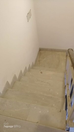 Staircase in 3.5 BHK Apartment at Emaar Emerald Floors Premier, Sector 65 – for Rent