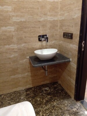 Bathroom in 4 BHK Apartment at Emaar Emerald Floors Premier, Sector 65 – for Rent