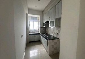 Kitchen in 2 BHK Apartment at Nimbus Express Park View - II, Chi V Greater Noida – for Rent