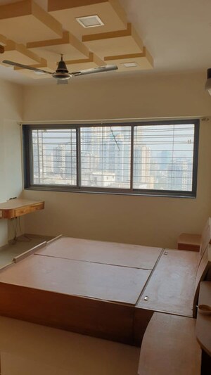 Room in 2 BHK Apartment at Mulund West – for Rent