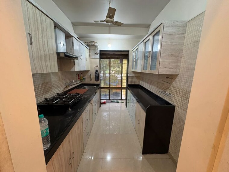 Kitchen, rosa-gardenia 2 Bedroom 750 Sq.Ft. Apartment In Ghodbunder Road Thane 10543445