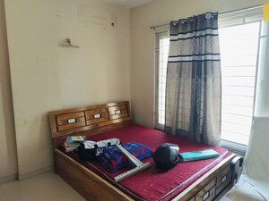 Bedroom in 2 BHK Apartment at Ganga Arcadia, Kharadi – for Rent