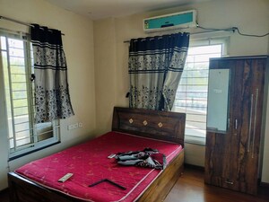 Bedroom in 2 BHK Apartment at Ganga Arcadia, Kharadi – for Rent