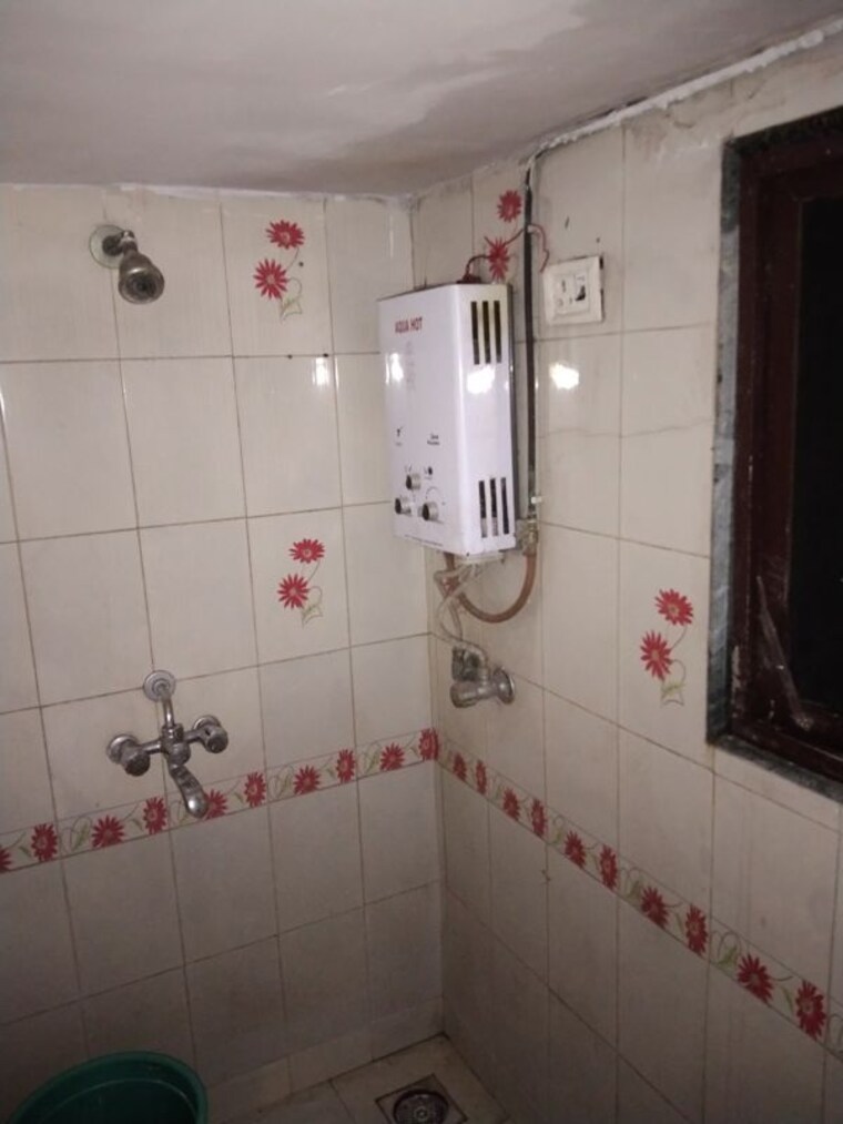 Bathroom, high-rise-apartments 1 Bedroom 635 Sq.Ft. Apartment In Ic Colony Mumbai 10543483