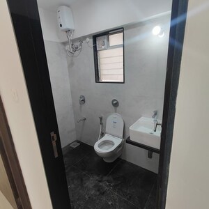 Bathroom in 2 BHK Apartment at Dem Phoenix, Malad East – for Rent