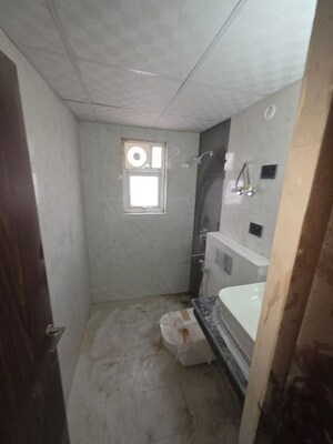 Bathroom in 3 BHK Apartment at Amrapali Silicon City, Sector 76 – for Rent