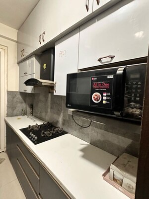 Kitchen in 3 BHK Apartment at Amrapali Silicon City, Sector 76 – for Rent