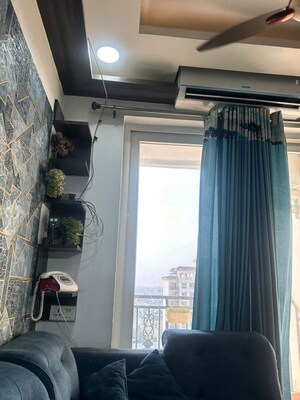 Living Room in 3 BHK Apartment at Amrapali Silicon City, Sector 76 – for Rent
