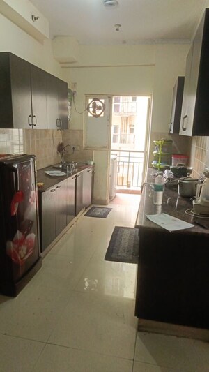 Kitchen in 2 BHK Apartment at Aims Golf City, Sector 75 – for Rent