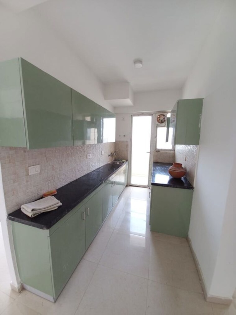 Kitchen, signature-the-millennia-2 2 Bedroom 690 Sq.Ft. Apartment In Sector 37d Gurgaon 10543653