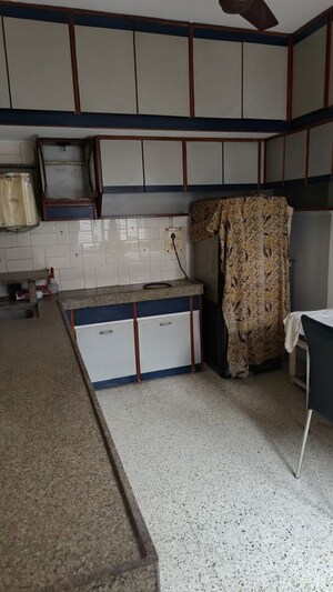 Kitchen in 2 BHK Apartment at Narayan Peth – for Sale