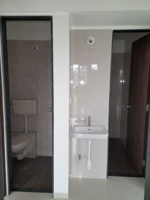 Bathroom in 1.5 BHK Apartment at Neel Sidhi Infinity, Khanda Colony – for Rent