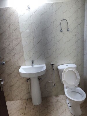 Bathroom in 3 BHK Apartment at Amrapali Hanging Gardens, Sector 107 – for Sale