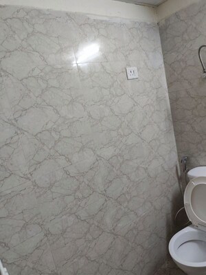 Bathroom in 3 BHK Apartment at Amrapali Hanging Gardens, Sector 107 – for Sale