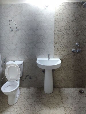 Bathroom in 3 BHK Apartment at Amrapali Hanging Gardens, Sector 107 – for Sale