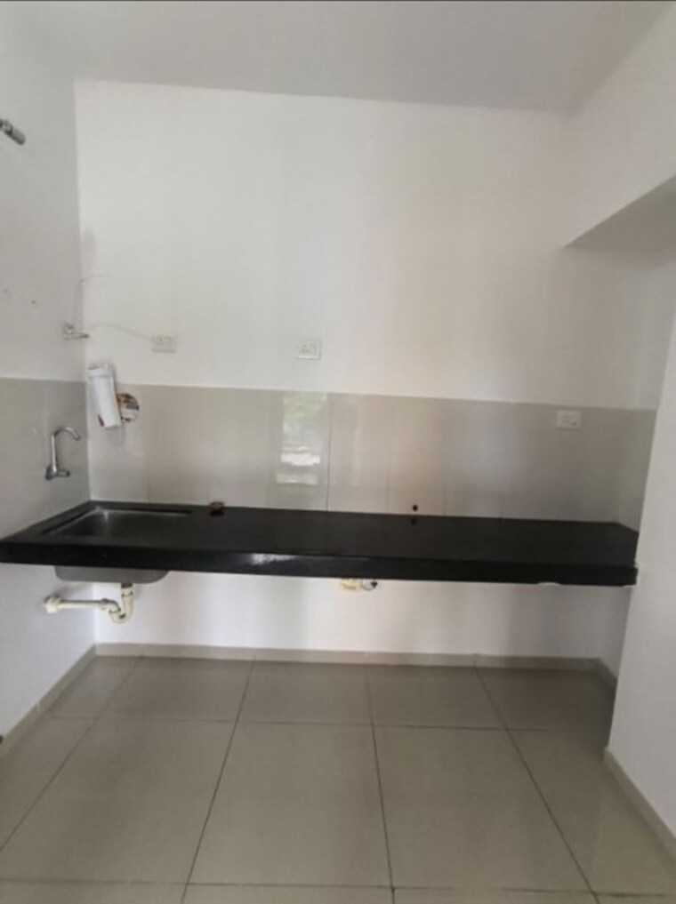 Kitchen, shapoorji-pallonji-joyville-hinjewadi 2 Bedroom 650 Sq.Ft. Apartment In Hinjewadi Pune 10543738