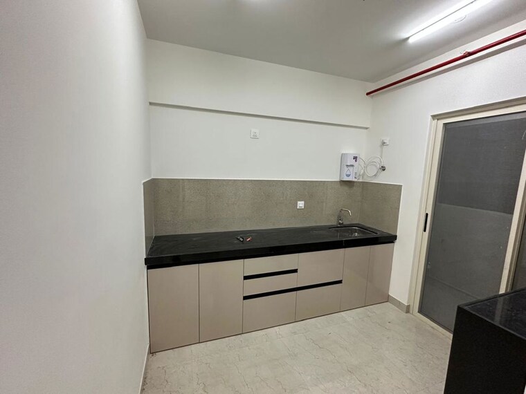 Kitchen, supreme-estia-phase-1 2 Bedroom 988 Sq.Ft. Apartment In Baner Pune 10538982