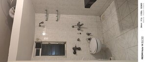Bathroom in 3 BHK Apartment at Serenity Tower, Andheri West – for Rent