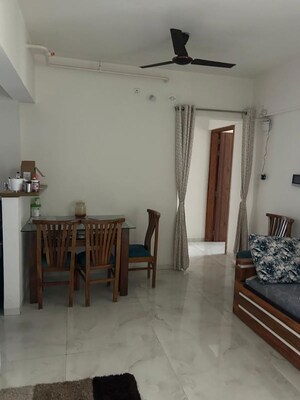 Living Room in 1 BHK Apartment at Mayfair Housing Mayfair Marvel, Malad West – for Rent