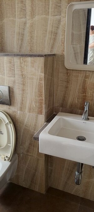 Bathroom in 2 BHK Apartment at Lodha Amara, Kolshet Road – for Rent