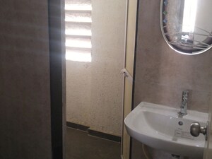 Bathroom in 2 BHK Apartment at Dedhia Platinum Lawns, Ghodbunder Road – for Rent