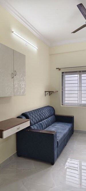 Living Room in 1 BHK Apartment at Halasuru – for Rent