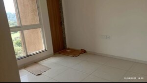 Room in 2 BHK Apartment at Godrej Upavan, Themghar – for Sale