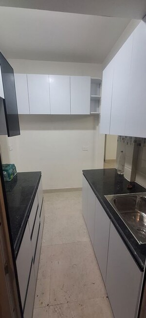 Kitchen in 2 BHK Apartment at Signature Global Orchard Avenue, Sector 93 – for Sale