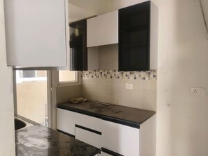 Kitchen in 2 BHK Apartment at Signature Global Orchard Avenue, Sector 93 – for Sale