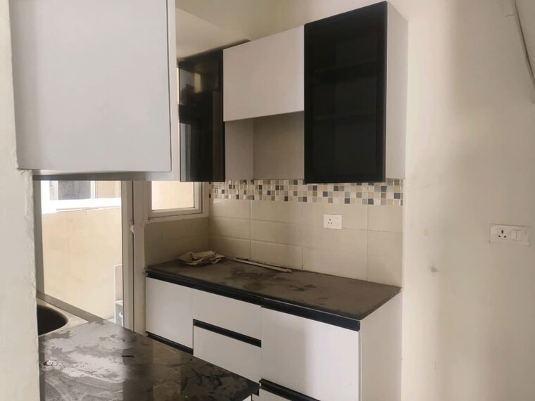 Kitchen, signature-global-orchard-avenue 2 Bedroom 680 Sq.Ft. Apartment In Sector 93 Gurgaon 10544138
