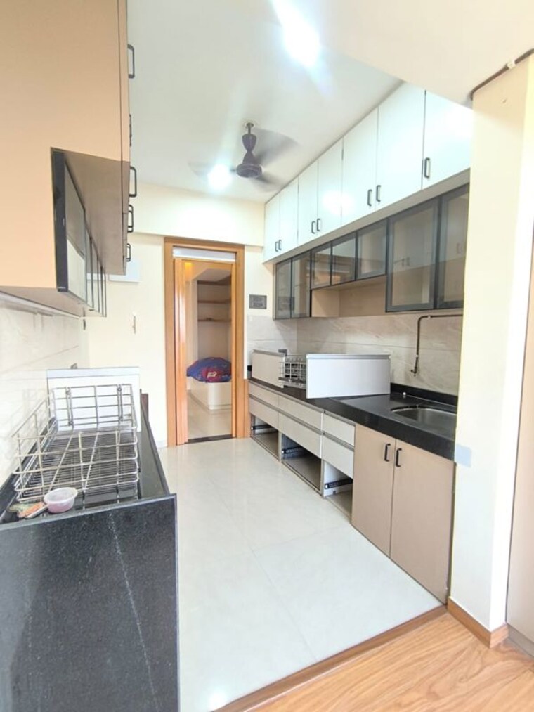 Kitchen, abrol-vastu-park 2.5 Bedroom 950 Sq.Ft. Apartment In Malad West Mumbai 10544162