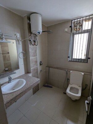 Bathroom in 3 BHK Apartment at Unitech Uniworld Gardens 2, Sector 47 – for Rent