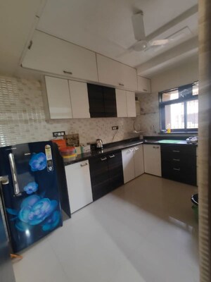 Kitchen in 2 BHK Apartment at Vikas Park CHS, Malad West – for Rent