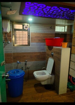 Bathroom in 4 BHK Apartment at Veernav Ram Niwas, Gokhale Road – for Rent