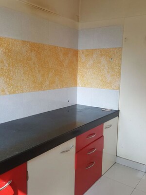 Kitchen in 2 BHK Apartment at Vijay Vilas Vega Building 1 to 6 CHS Ltd, Kavesar – for Rent