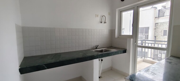 Kitchen, bptp-park-elite-floors 3 Bedroom 180 Sq.Ft. Builder Floor In Sector 85 Faridabad 10544393