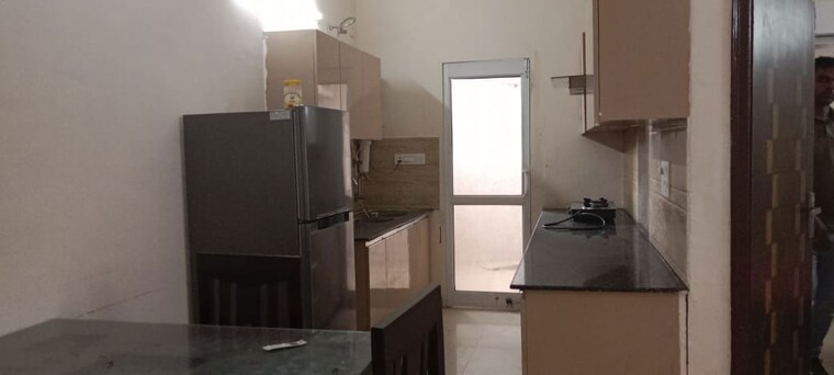 Kitchen, sunshine-enclave 1 Bedroom 790 Sq.Ft. Apartment In Vip Road Zirakpur 10544405