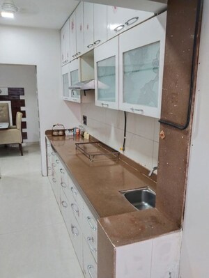 Kitchen in 3 BHK Apartment at Evershine Grandeur, Malad West – for Rent